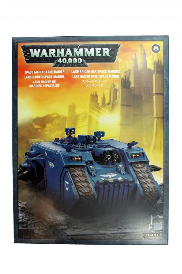 Warhammer 40,000 tank model box art, featuring detailed design and customizable assembly options.