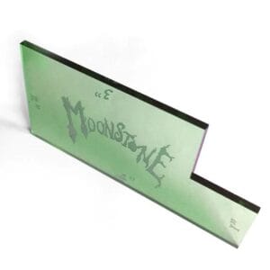 Translucent green L-shaped art piece titled MOONSTONE evokes whimsy and modern design.