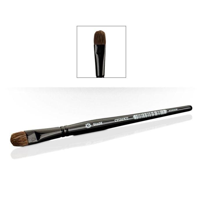 Premium black makeup brush with soft brown bristles for precise and seamless application.